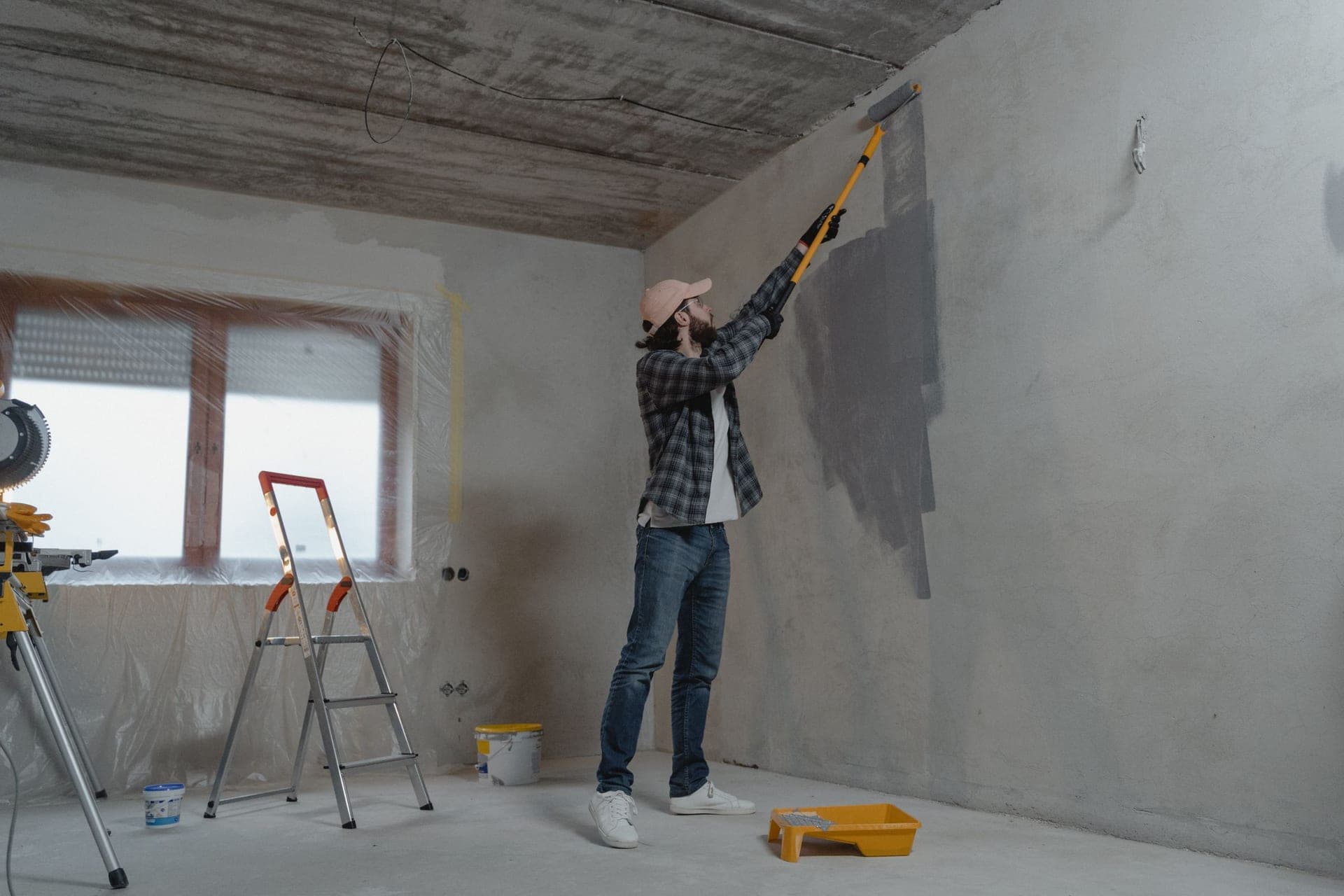 Unfinished room being painted during a renovation — illustrative of construction cleaning across Sydney