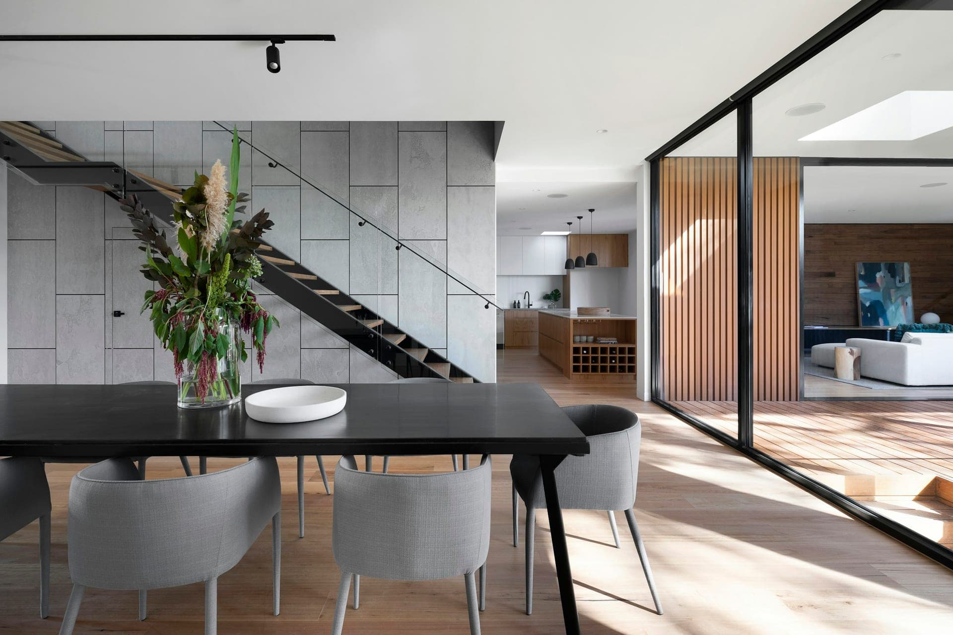 Floor-to-ceiling glass doors in a bright interior — illustrative of window cleaning across Sydney